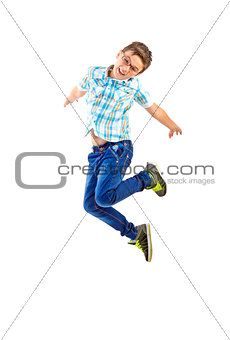 little boy jumping on white background