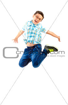 happy little boy jumping on withe