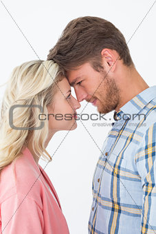 Young couple looking at each other over