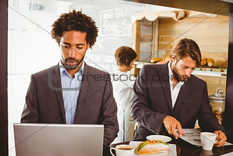 Businessmen enjoying their lunch hour