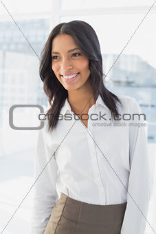 Businesswoman smiling at her workplace