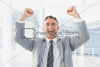 Businessman celebrating a good job