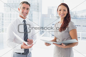 Business people smiling and talking