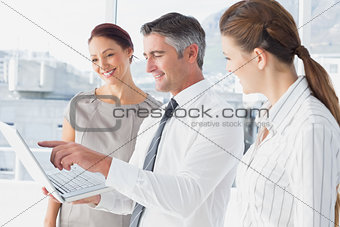 Businessman using laptop at work