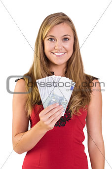 Pretty blonde showing wad of cash