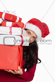 Woman holding many christmas presents