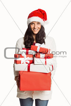 Smiling woman with christmas presents