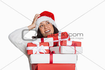 Shocked woman with christmas presents