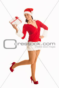 Woman smiling with christmas present