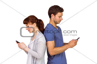 Couple both sending text messages