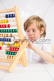 Student doing maths on abacus