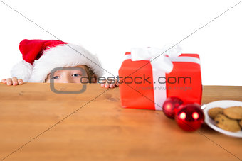 Child looking at christmas present