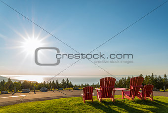 Red chairs from Butland lookoff  with a beautiful view of Fundy 