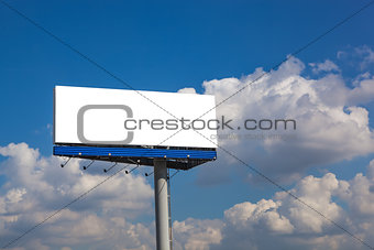 Blank billboard on blue sky with clouds