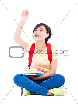 asian student girl sitting  and drawing over white background