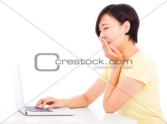 crying woman in front of a laptop, isolated on white background