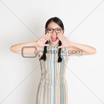 Asian Chinese girl  shouting loud