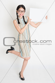 Asian Chinese female hands holding a blank white card