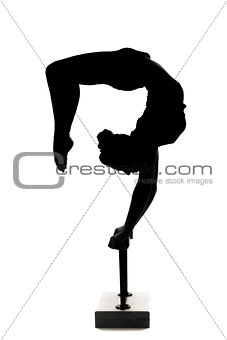 caucasian woman contortionist practicing gymnastic yoga in silho
