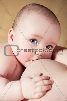 Mother breast feeding her infant 