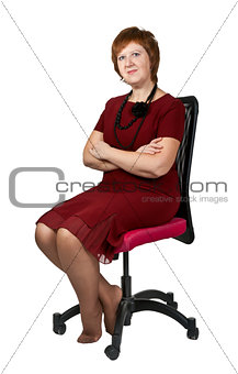 middle-aged woman in a chair