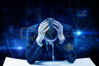 Composite image of businessman with head in hands