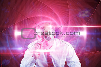 Composite image of focused businessman with magnifying glasses