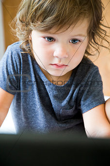 toddler and laptop