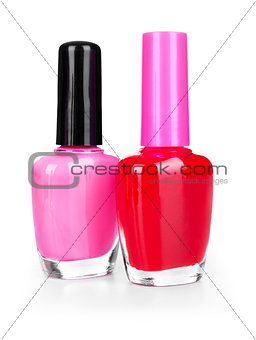pink and red nail polish on a white background isolated
