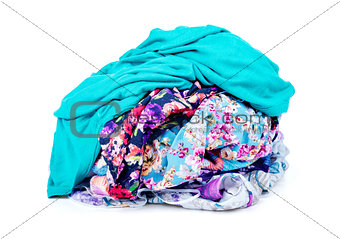 A pile of dirty laundry. clothes never end. Isolated on white