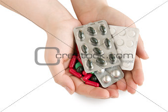 Handful of medicine isolated on white background with clipping path.
