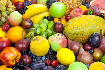 Mix of organic fruits - background