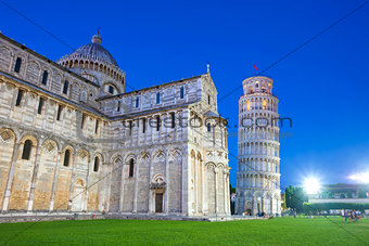 Piazza del Duomo with Pisa tower and the Cathedral illuminated a