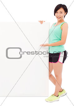 young female athletes holding a empty board