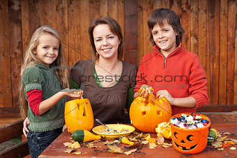 Happy family preparing for Halloween
