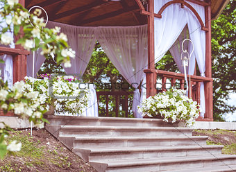 Beautiful wedding gazebo with flower decoration