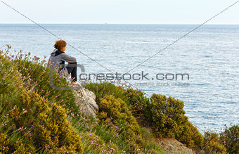 Woman on Potistika beach. Morning view (Greece)