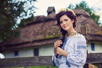 Young beautiful woman in traditional Ukrainian clothing