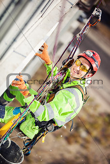 Industrial climber on a building