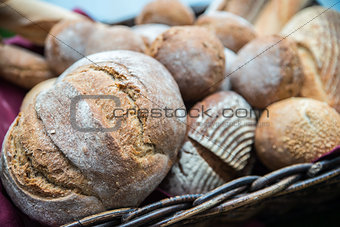 Delicious bread and rolls in basket
