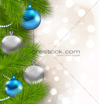 Christmas glowing background with fir branches and glass balls