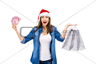 Beauitful Santa woman holding shopping bags