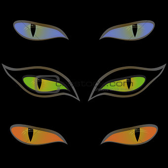 Three pairs of cat eyes over black