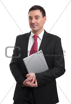 Portrait of smiling young businessman with laptop