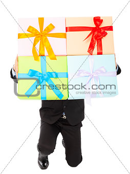 Businessman holding gifts and kneel down .
