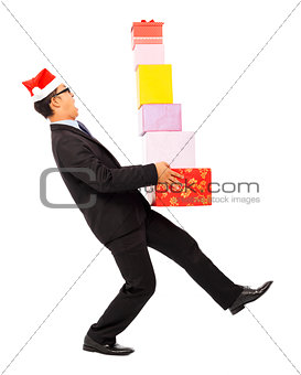 businessman holding gift boxes and scared to fall.