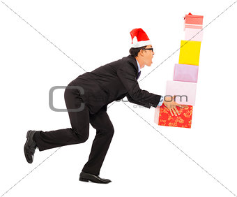 businessman holding some gift boxes. isolated on white