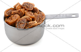 Chopped figs in a cup measure