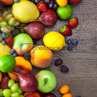 Background of Colorful Fruits with water drops 