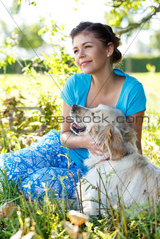 Attractive girl with dog